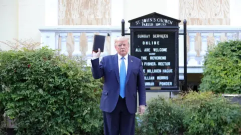 Reuters President Trump holds a bible in front of St John's Episcopal church in Washington DC