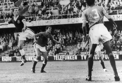 Keystone 13th June 1958: John Charles attacking for Wales in the 1-1 draw with Mexico in the World Cup in Sweden