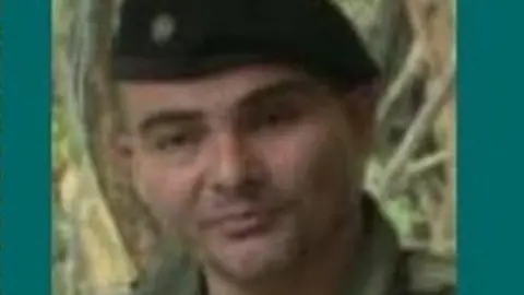 Colombian police Crop of wanted poster offering reward for capture of Iván Mordisco