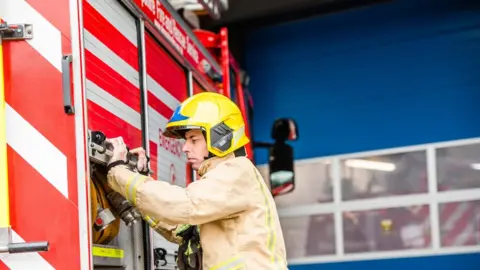 Shropshire Fire and Rescue Service A firefighter