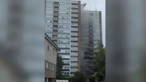 Andrew Carberry Fire damage at block of flats