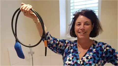 Susan Young Susan Young with a toilet bung