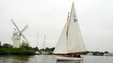 Richard Sowersby/BBC Sailing boat on the Broads