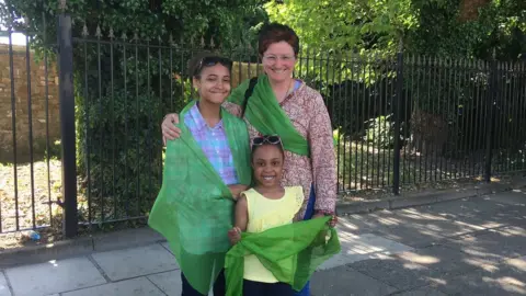 Chrisma (six), Natasha (12) and Jenny enjoyed the festival atmosphere