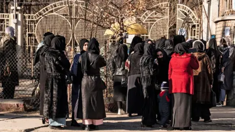 Getty Images Female students outside the Kabul University campus