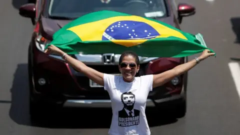 Reuters A Bolsonaro supporter in Brasilia