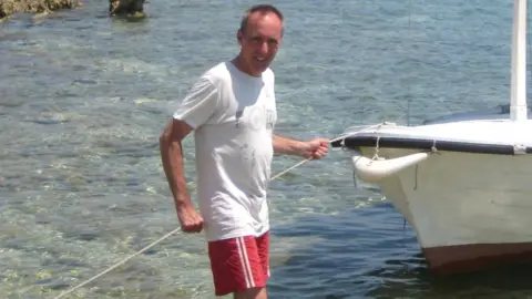 Family handout / PA Mr Davies before the illness struck