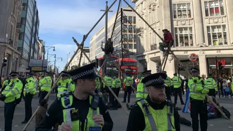 Nathan Williams/ BBC News Extinction Rebellion protest in Oxford Circus