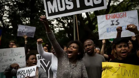 Getty Images A protest outside the Gupta family compound earlier this year