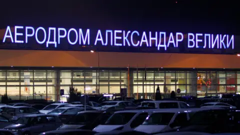 Reuters Cars are parked in front of the airport Alexander the Great in Skopje