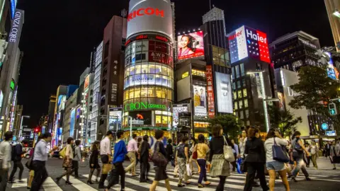 Getty Images Street scene of Ginza, a key business district in Tokyo