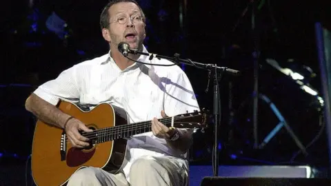 Getty Images Eric Clapton playing in the US