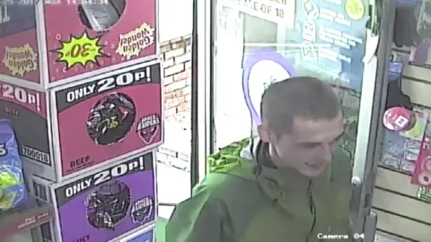 CCTV of David Woods entering a shop