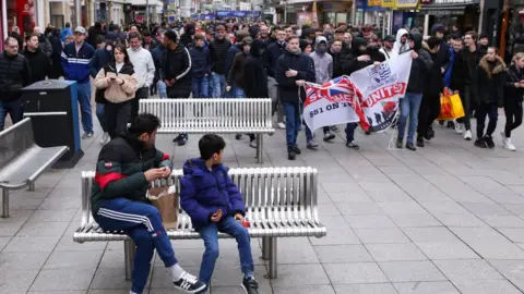 Getty Images Southend United fans marching in the city high street