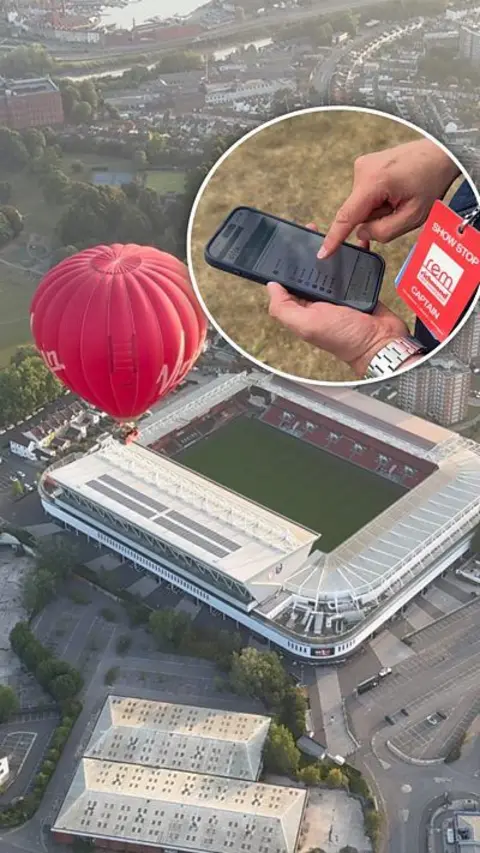 A hot air balloon over Ashton Gate stadium, seen from the sky