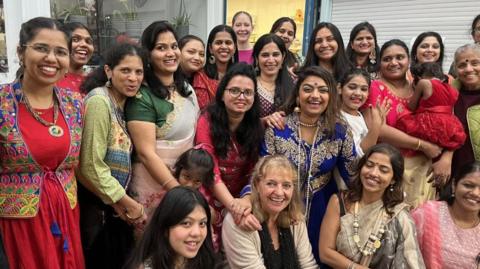 A group of people celebrating Diwali in Jersey