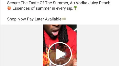 PA Media A screen  grab of an add on Facebook. I shows a caption, reading Secure The Taste Of The Summer, Au Vodka Juicy Peach [peach emoji] Essences of summer in every sip. [palm tree emoji] Shop Now Pay Later Available [credit card emoji]."
Below is a link to a video with the title shot showing Kai Cenat with his mouth open as he holds a drinking glass