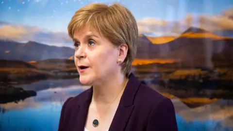 Getty Images Nicola Sturgeon wearing a necklace with a large pendant