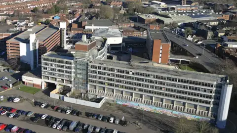 Martin Barber/BBC Sovereign House can be seen in the foreground from the air, with the neighbouring Anglia Square buildings in view, which were built in the 1960s and 1970s.