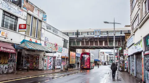 Getty Images  A view of Rye Lane in Peckham on a wet winter day in 2025.