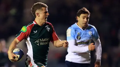Billy Searle runs with the ball for Leicester