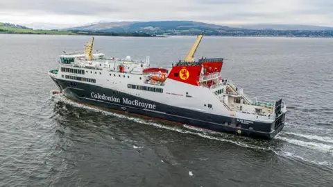 Glen Sannox, a black and white ferry with red funnels heads out into the Firth of Forth