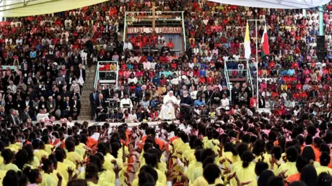 Getty Images Pope Francis pictured at an open-air Mass in Madagascar