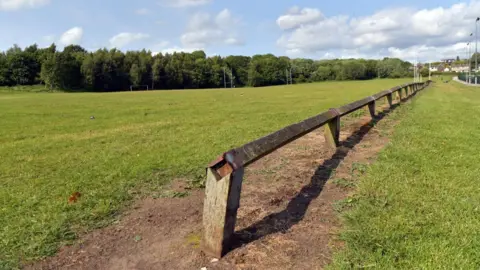 A view of the empty sports pitches at Horsfall Playing Fields.