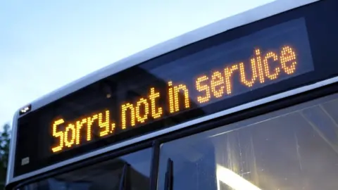 Getty Images Sorry not in service sign on bus