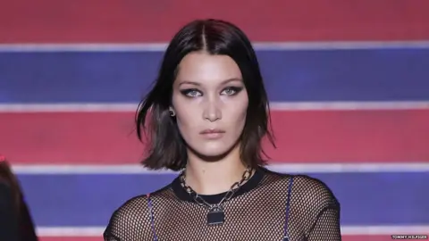 Tommy Hilfiger Bella Hadid also walked the Hilfiger show