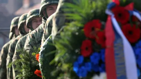 EPA Members of a Serbian military honour guard prepare for a wreath laying ceremony at the French military cemetery during the Armistice Day commemorations marking the end of World War I, in Belgrade, Serbia, 11 November 2017