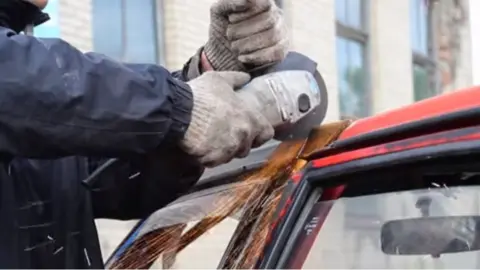 Garage 54 Russian motor enthusiasts join three cars together