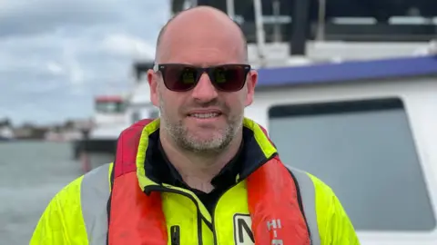 Shaun Whitmore/BBC Owen Nutt a boat owner in Lowestoft Port