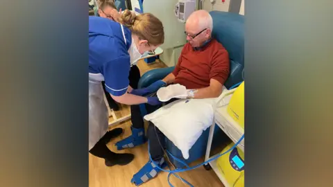 Clatterbridge Cancer Centre Brian Conroy with nurse