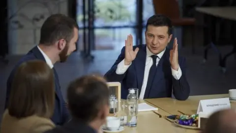 President Volodymyr Zelensky speaks with media during a press marathon at the Creative State Arsenal venue in Kiev, Ukraine, 26 November 2021.