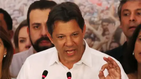 Reuters Fernando Haddad, presidential candidate of Brazil's leftist Workers Party (PT), speaks during a news conference during a runoff election in Sao Paulo, Brazil October 28, 201