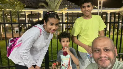 BBC Ahmed with his children