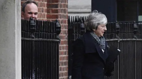 EPA Theresa May leaves the back entrance of No 10 on 14 January