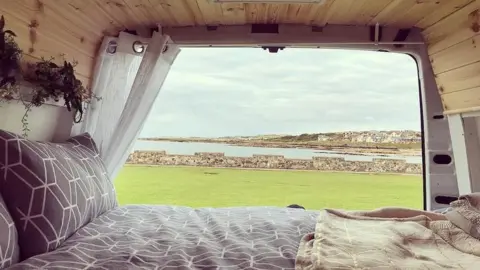 Jennifer McKenchnie Bed in a van