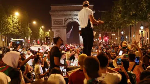 Getty Images Algerian fans in Paris