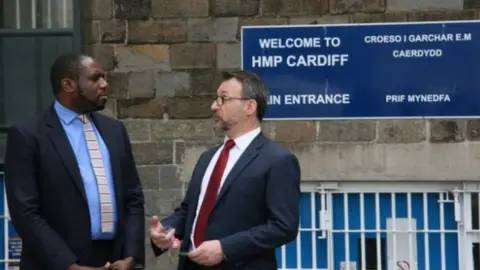 David Lammy MP (left) was shown around Cardiff prison by governor Darren Hughes in July 2016