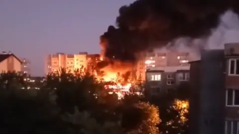 Twitter Footage shared on social media showed flames pouring from an apartment block