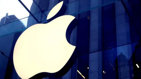 Reuters The Apple logo stuck to a glass building