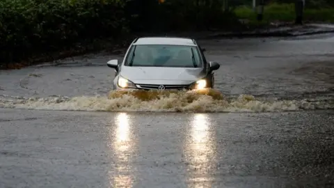 car in floods in recent wet weather