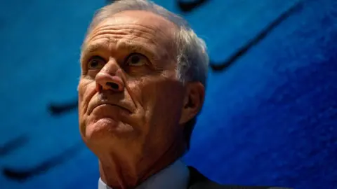 Reuters Richard Spencer, the former US navy secretary - looking upwards