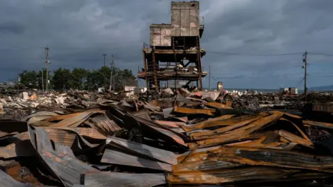 Getty Images The Asaichi Yokocho, or Wajima Morning Market, is seen after a fire incident following an earthquake on New Year's Day on January 05, 2024 in Wajima, Japan.