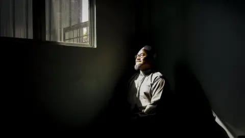 JOSHUA PAUL FOR THE BBC Ustaz Zaki