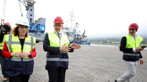 PAUL FAITH/AFP/Getty Images Michael Gove with Clare Guinness, CEO of Warrenpoint Harbour, in August 2019