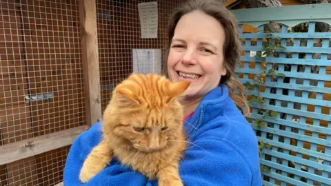 Susie Phillips and a cat