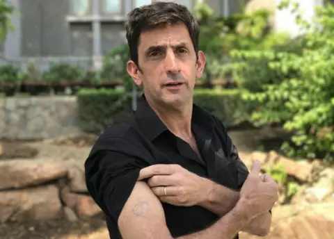 BBC Justin Rowlatt with his tattoo